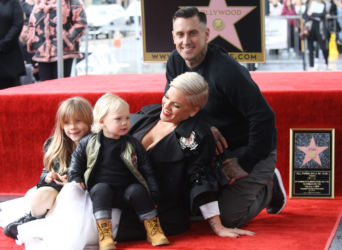 Image Source: Carey Hart, Alecia Beth Moore aka Pink with their children, Jameson Moon Hart and Willow Sage Hart attend the ceremony honoring Pink with a Star on The Hollywood Walk of Fame held on February 05, 2019 in Hollywood, California. (Getty Images | Photo by Michael Tran | FilmMagic)