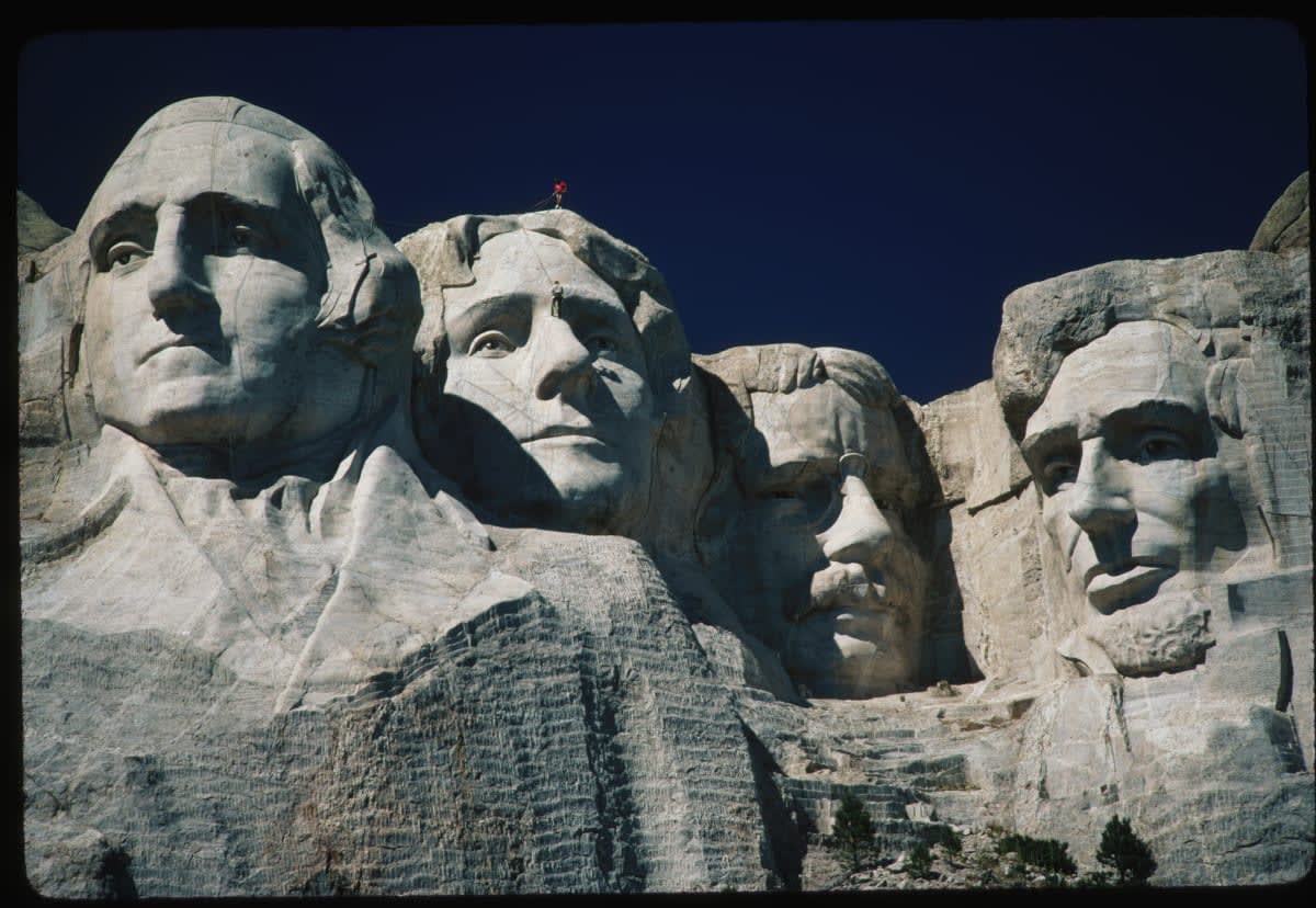 Image Source: The national memorial was designed by sculptor Gutzon Borglum and carved between 1927 and 1941. South Dakota, USA. | Located in: Mount Rushmore National Memorial. (Photo by D.B. Bartruff/Corbis via Getty Images)