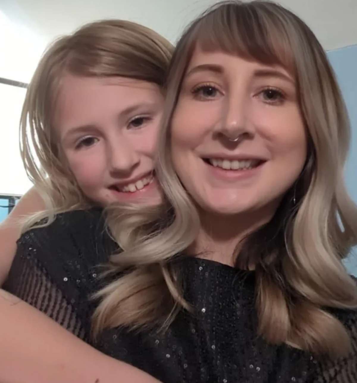 A woman's edited photo with shorter bangs (Image Source: Reddit | u/ProThoughtDesign)