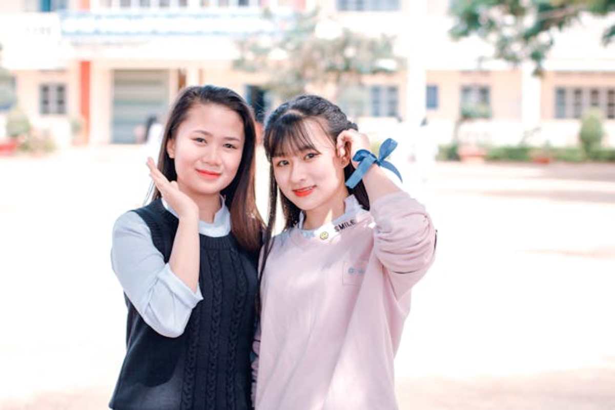 Two girls posing for the camera. Representative Image Source: Pexels | Chu Chup Hinh