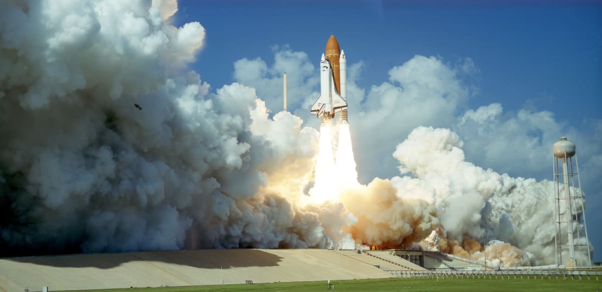 Image Source: Launch of Space Shuttle Challenger from Kennedy Space Center, Florida, USA, 1985.  Challenger was lost, together with its crew of seven, when it exploded 73 seconds after lift-off on 28th January, 1986. (Photo by Oxford Science Archive/Print Collector/Getty Images)
