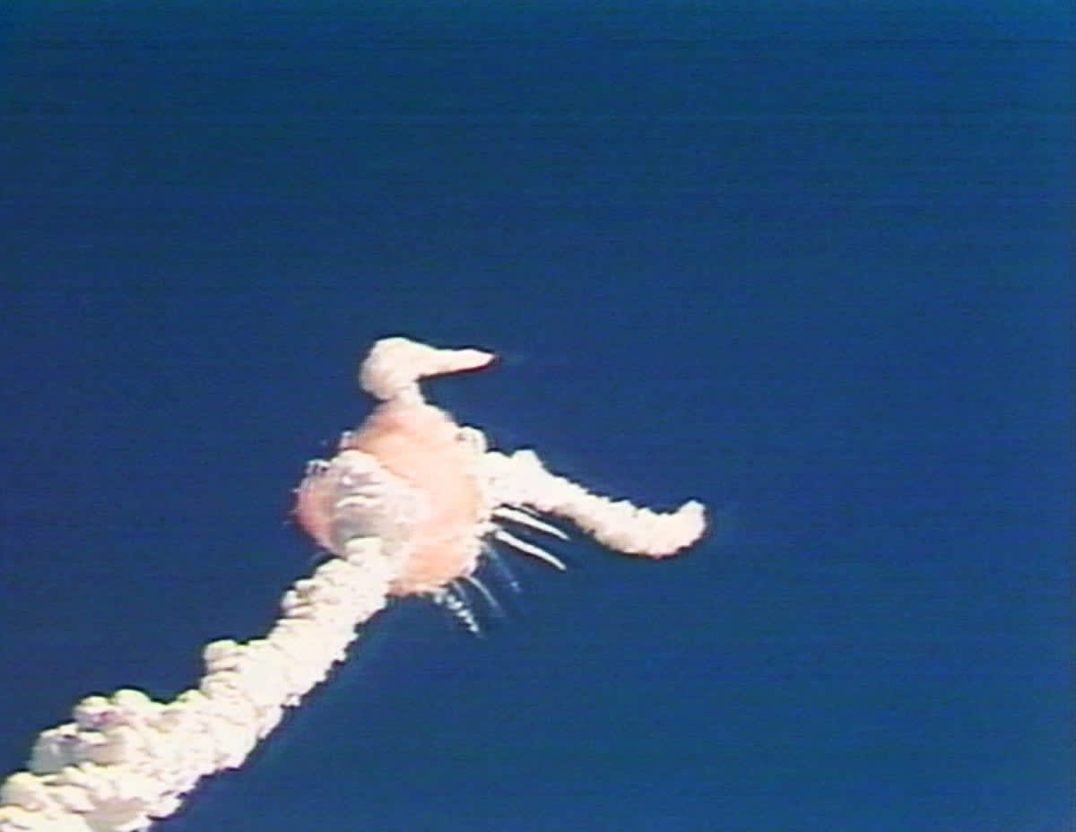 Image Source: The Space Shuttle Challenger explodes minutes after takeoff from Kennedy Space Flight Center January 28, 1986 at Cape Canaveral, Florida. All seven aboard were killed including Christa McAuliffe who had won a nationwide competition to be the first teacher in space. (Photo by CNN via Getty Images)