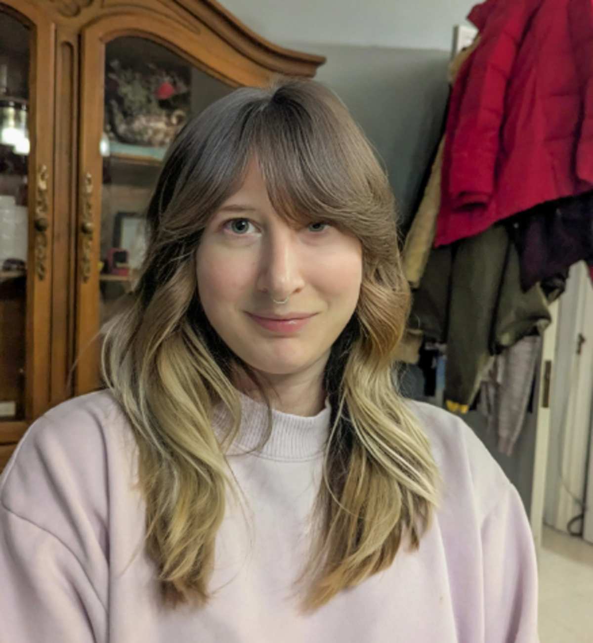 A woman's edited image with her hair styled into fringes and layers (Image Source: Reddit | u/akashharsana)
